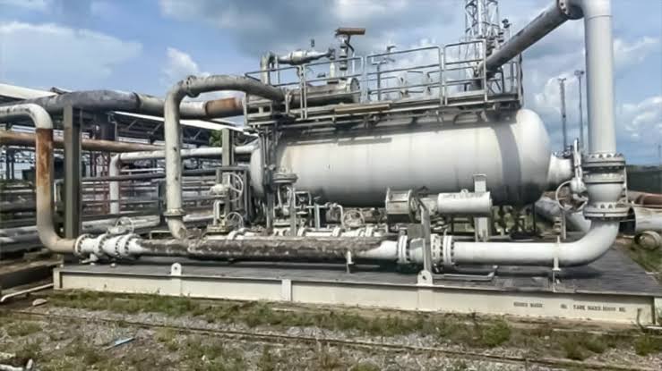An image featuring overland oil pipelines weaving through the Niger Delta terrain alongside heavy gas gathering