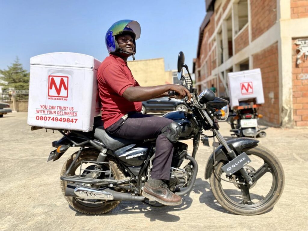 Delivery rider carrying parcels in Nigeria