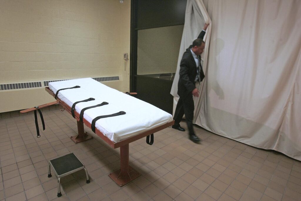 Execution chamber with a gurney and closed curtain at a US prison